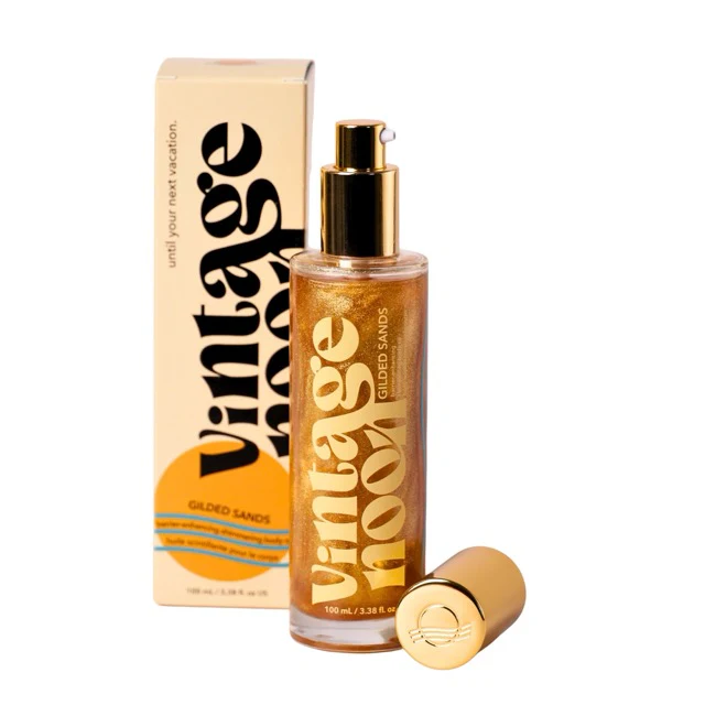 Barrier Enhancing Shimmering Body Oil bottle with golden shimmer